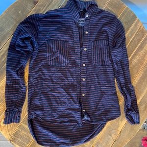 It’s a striped button up shirt.